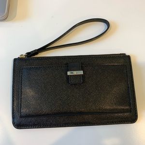 Black kate spade wallet/ wristlet. Black with gold hardware.